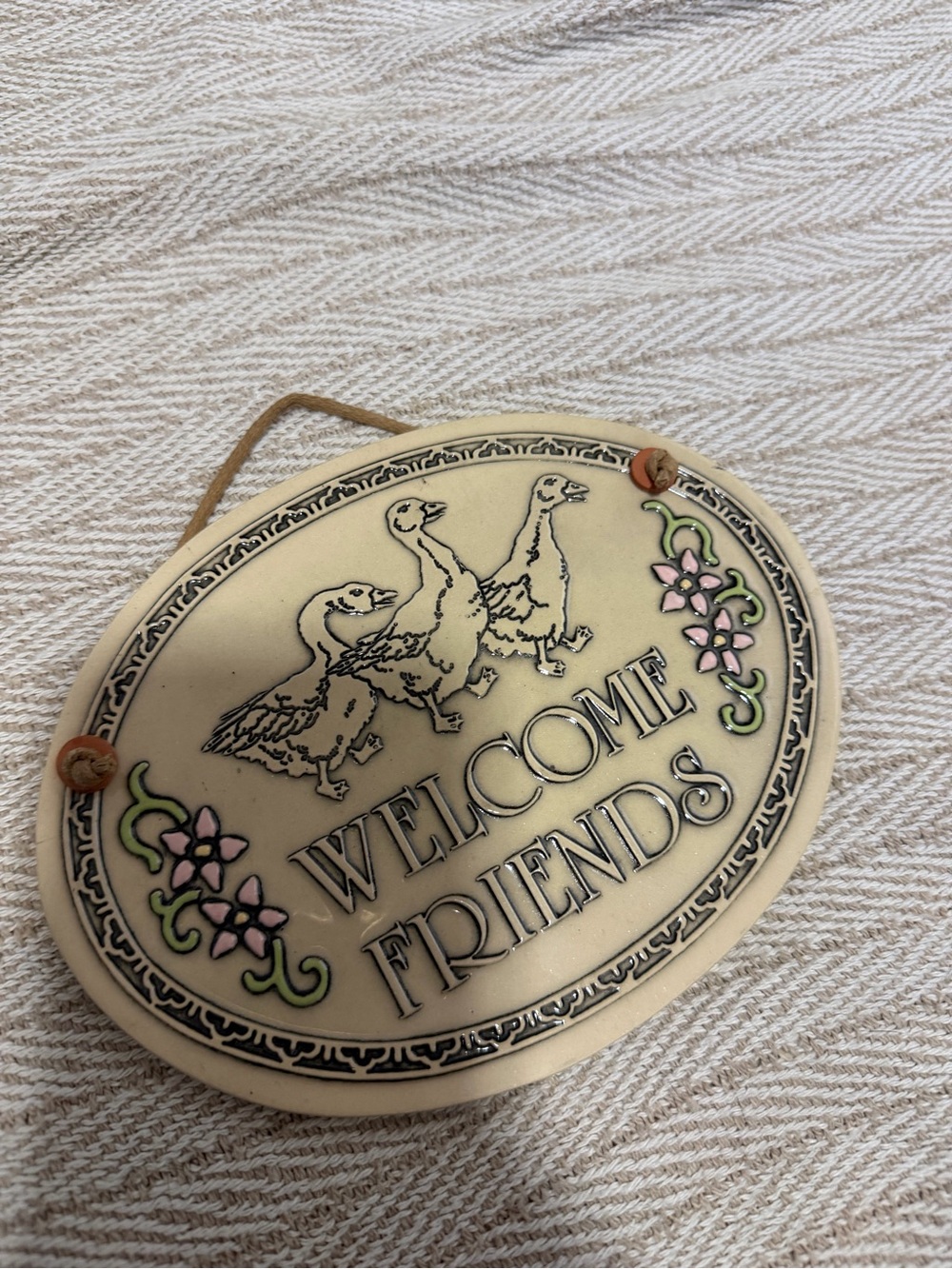 Welcome Friends Oval Wall Plaque in Cream with Pink & Green Accents